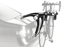 The Thule 9001 raceway 2-Bike rear mounted bike rack installed on the trunk of a car